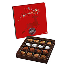 Cette boîte habillée des couleurs et des motifs festifs vous offre une sélection de truffes au chocolat, de truffes au Marc de Champagne, des truffes café et des truffes au caramel et sel de Guérande.